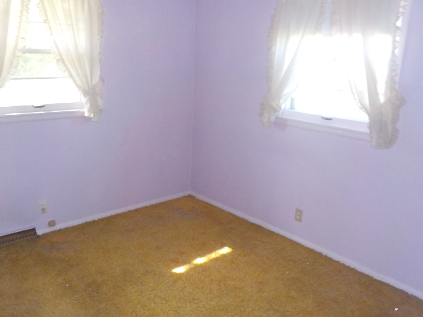 104 Janet Avenue Rochelle, IL 61068 - Photo 9 of 14 an empty room with a window