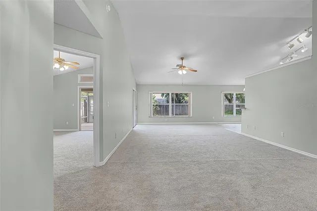 a view of a kitchen with a sink cabinets and a window