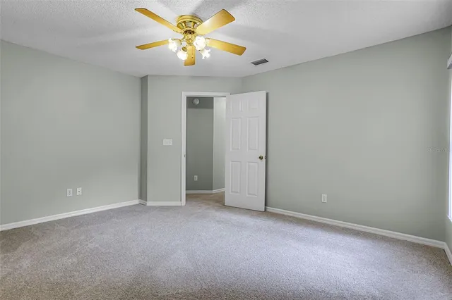 a view of a storage & utility room with racks on the wall