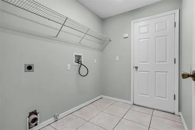 an empty room with a empty space and windows