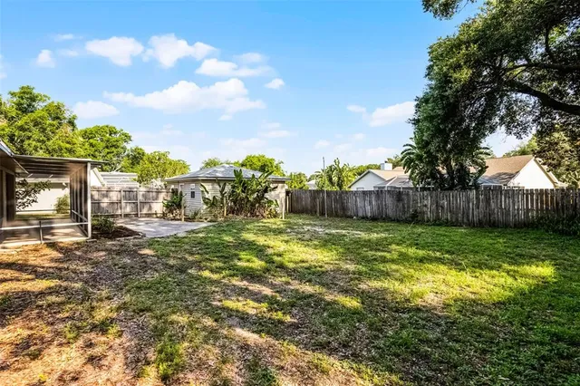 a view of a garden with an ocean