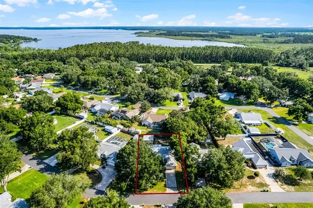 a view of a garden with an ocean