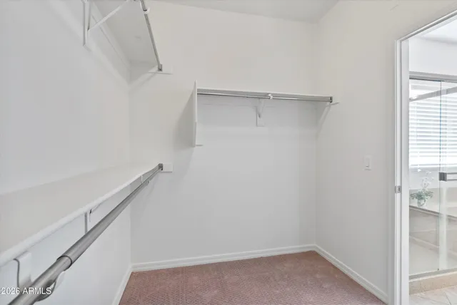 a view of a room with rack on the wall