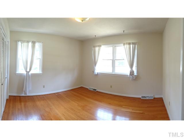 4900 Winterlochen Road Raleigh, NC 27603 - Photo 8 of 14 Bedrooms are spacious & bright, perfect for your growing needs.