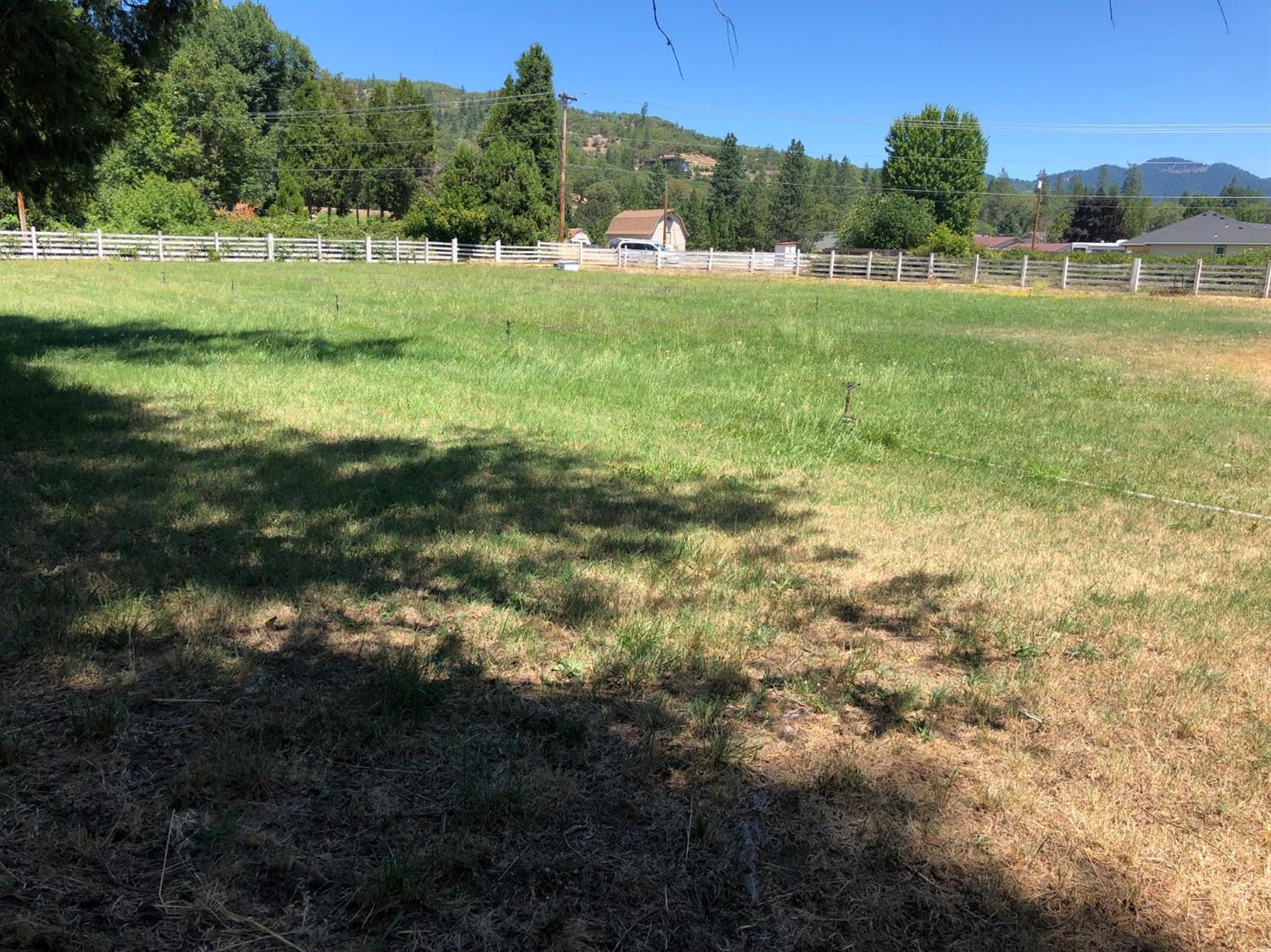 2368 Upper River Road Grants Pass, OR 97526 - Photo 30 of 30 a view of a green field with trees