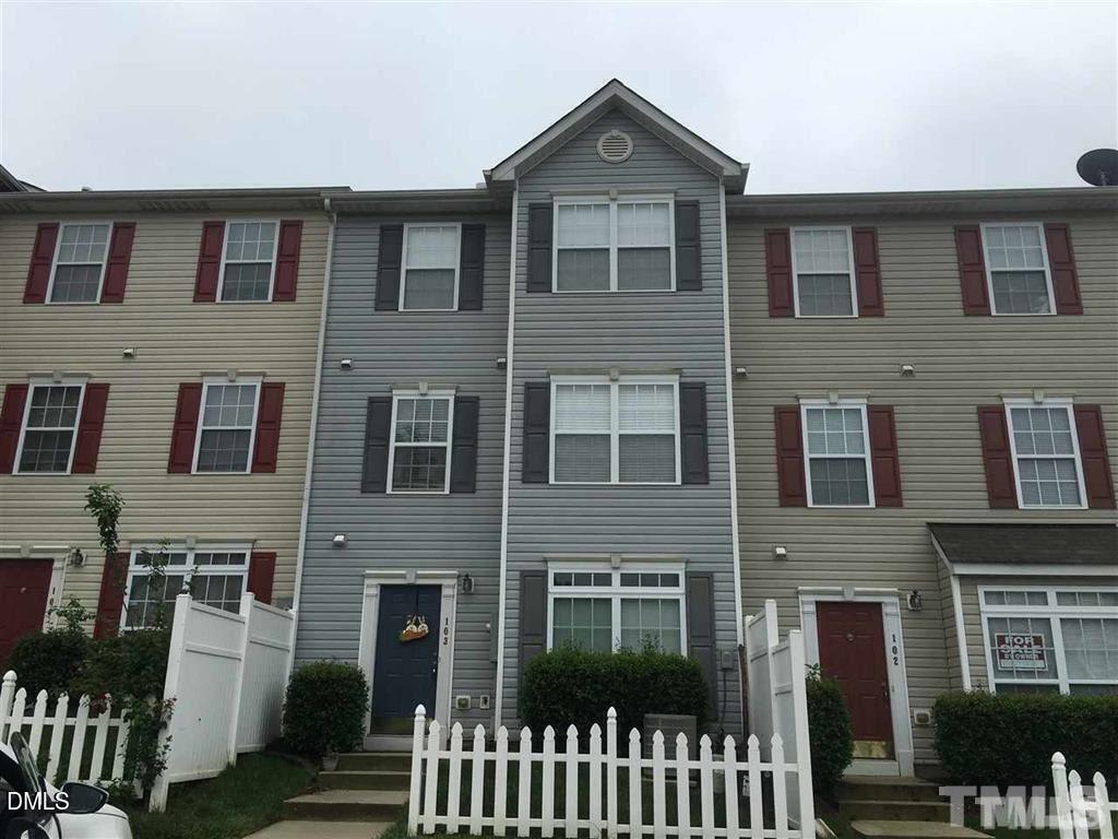 3020 Barrymore Street, Unit 103 Raleigh, NC 27603 - Photo 1 of 4 a front view of a house