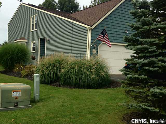 6145 Diffin Road Cicero, NY 13039 - Photo 1 of 1 Exterior Front Landscaped entrance to end unit