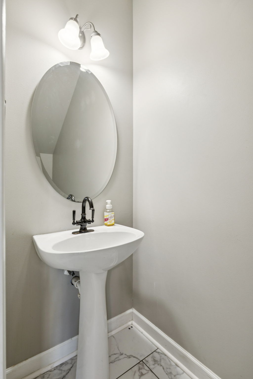 1832 Lincoya Bay Drive Nashville, TN 37214 - Photo 11 of 33 a bathroom with a sink and mirror