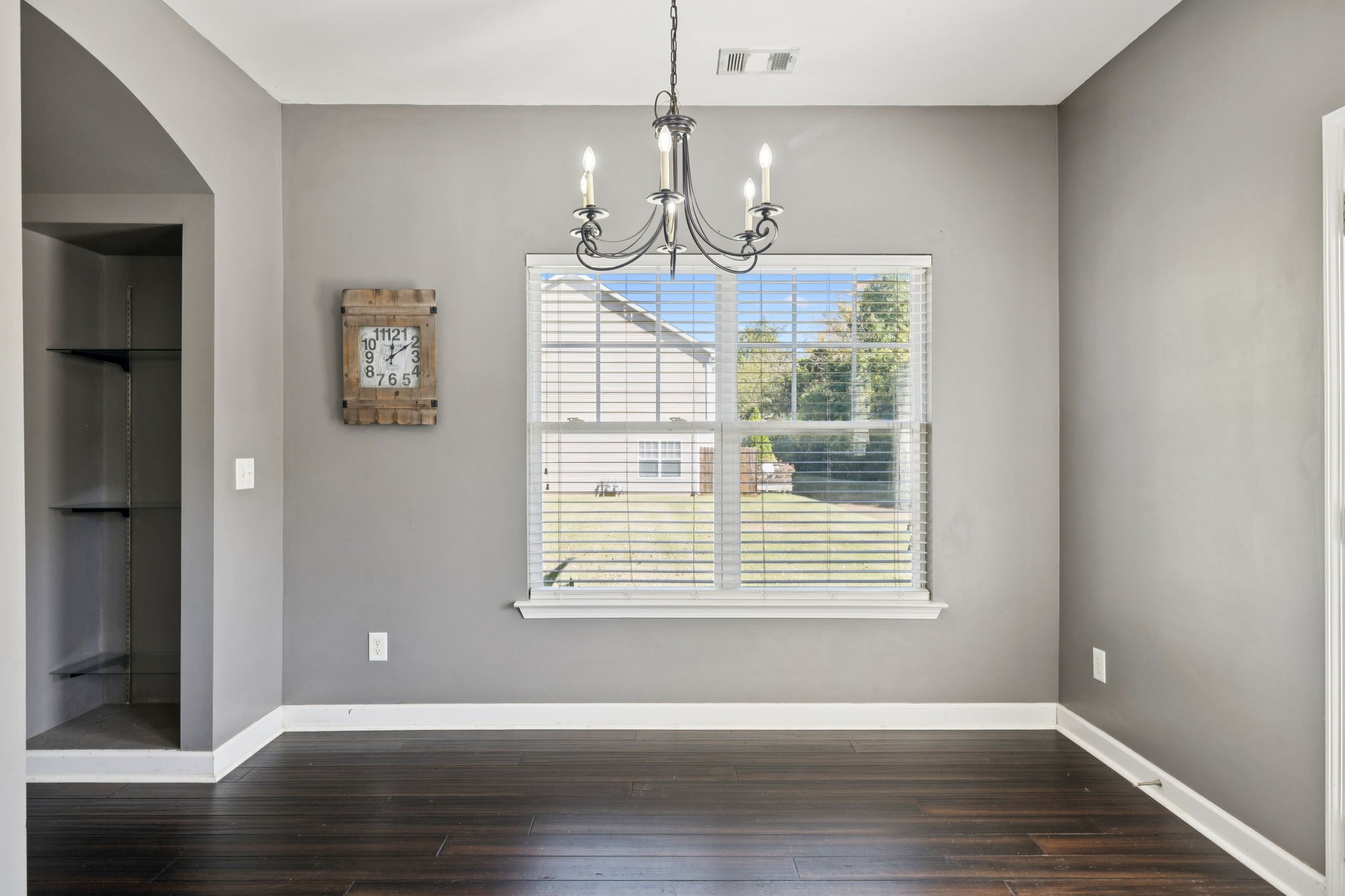 1832 Lincoya Bay Drive Nashville, TN 37214 - Photo 25 of 33 a view of an empty room with wooden floor and a window