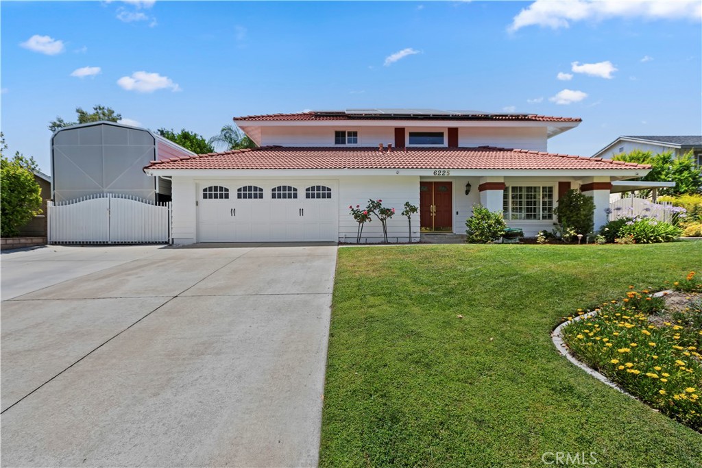 6225 Promontory Lane Riverside, CA 92506 - Photo 1 of 20 a front view of a house with a yard