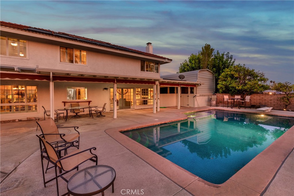 6225 Promontory Lane Riverside, CA 92506 - Photo 15 of 20 an outdoor view of house with swimming pool