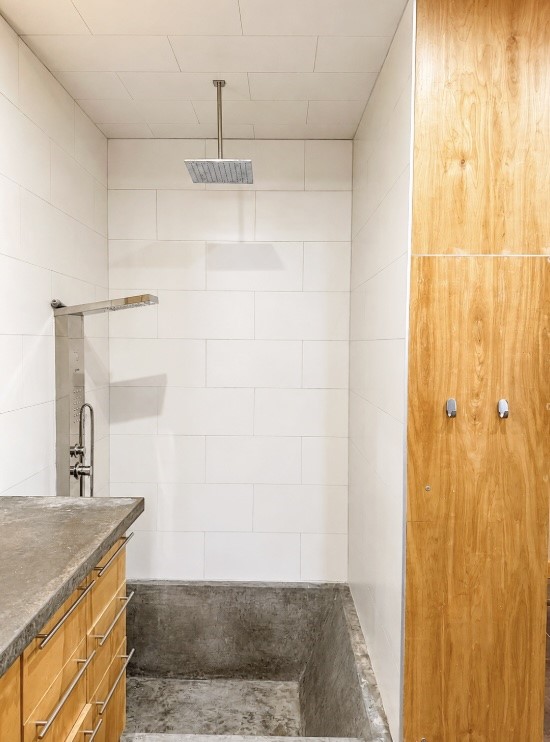 4530 Walker Street Houston, TX 77023 - Photo 14 of 17 a bathroom with a granite countertop sink and a mirror