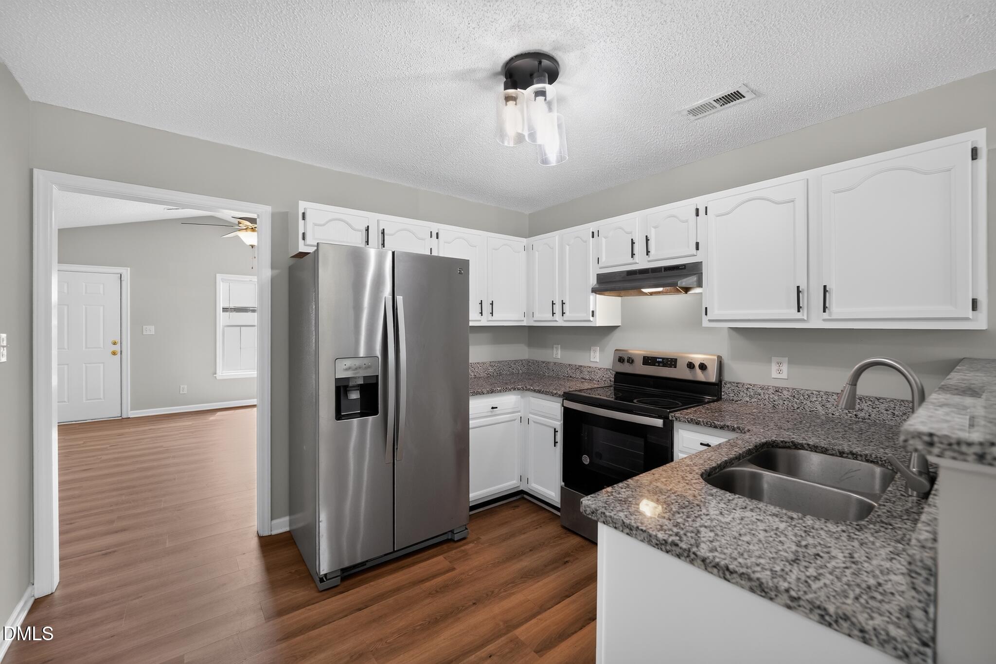 904 Rauhut Street Burlington, NC 27217 - Photo 9 of 38 13_904_Rauhut_St-Kitchen-3268