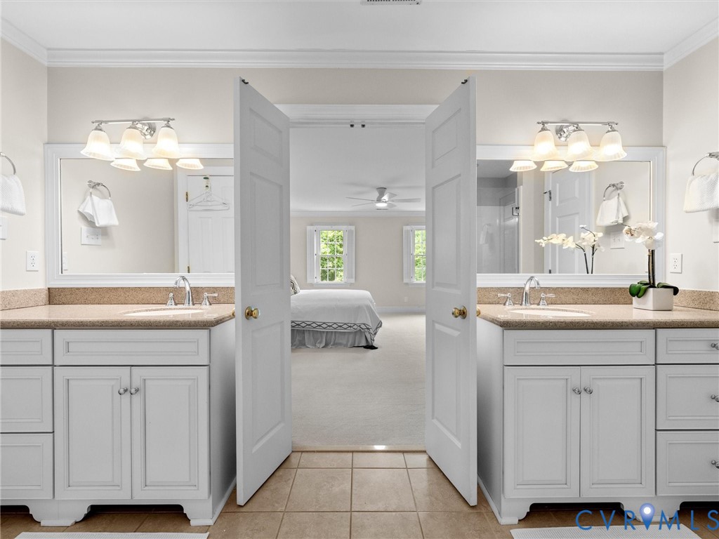 2011 Gamelaw Court Midlothian, VA 23113 - Photo 40 of 77 a bathroom with a double vanity sink and a mirror