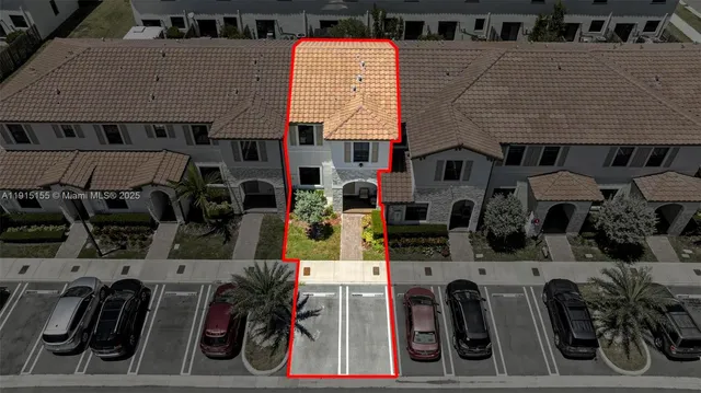 a utility room with dryer and door