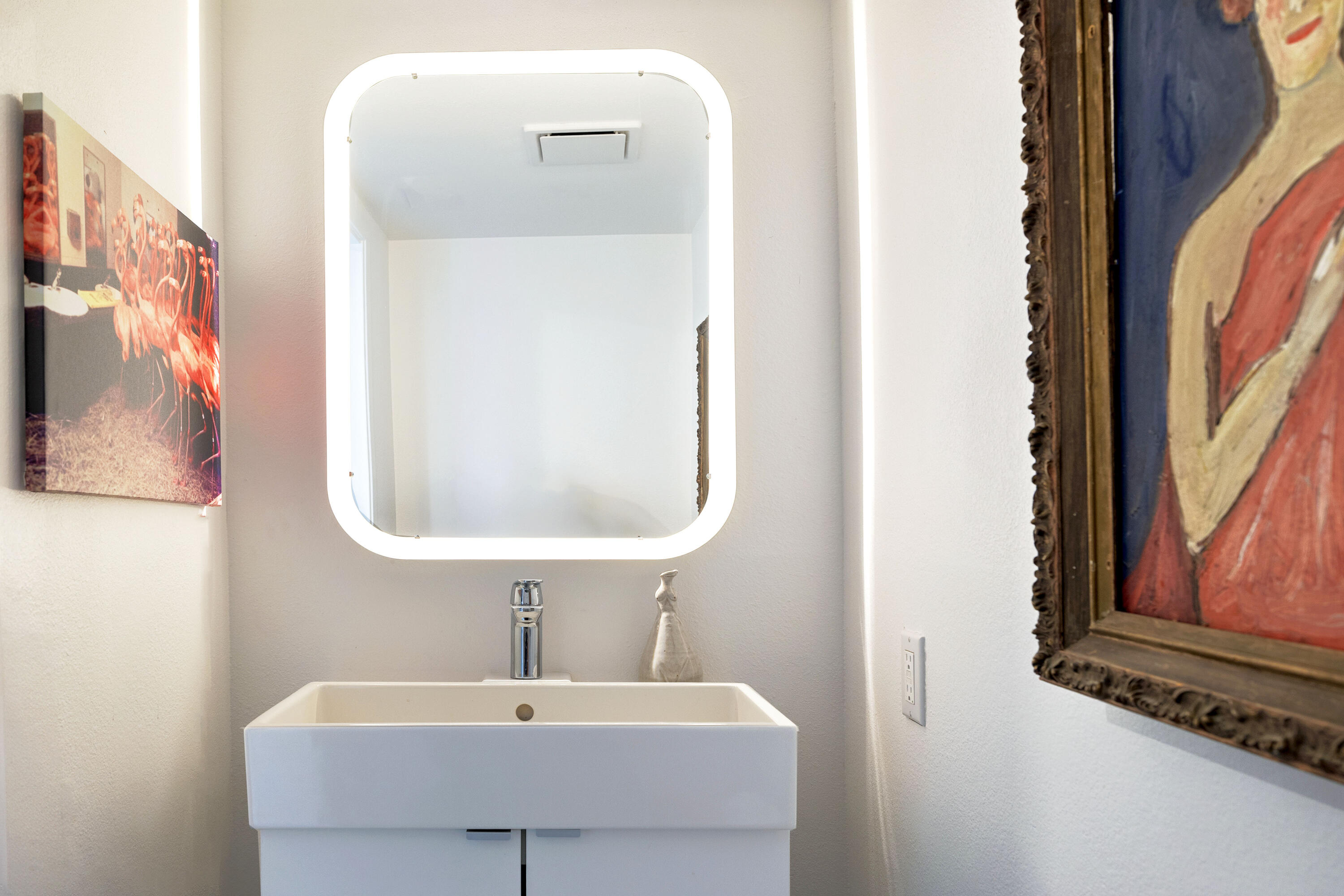 250 East Via Escuela, Unit G Palm Springs, CA 92262 - Photo 10 of 25 a bathroom with a sink and a mirror