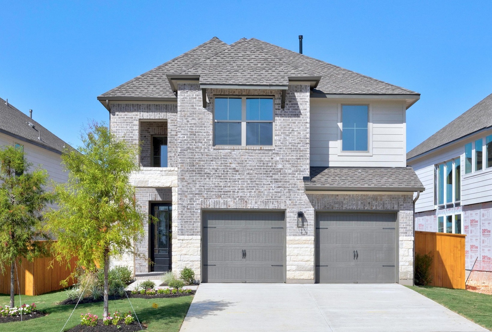 129 Emerald Grv Drive Georgetown, TX 78633 - Photo 1 of 34 Move in Ready. Westin Homes *New Construction* Retreat II Plan. Grass is digitally enhanced.