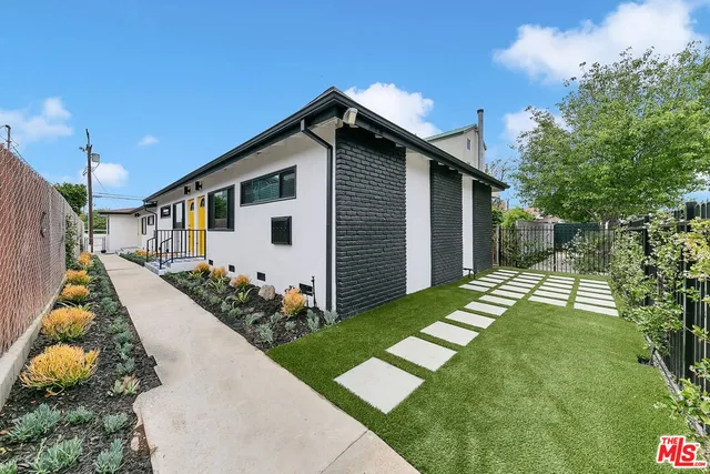 a front view of house with yard