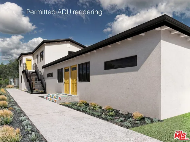 a front view of a house with garage