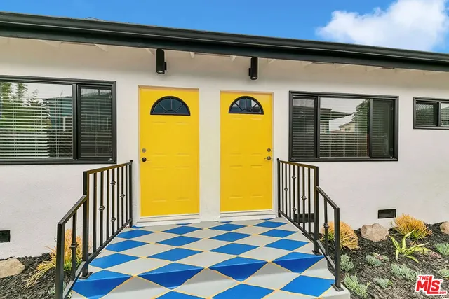 a front view of a house with a balcony