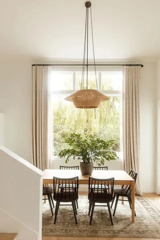 a view of a chair and table in a balcony