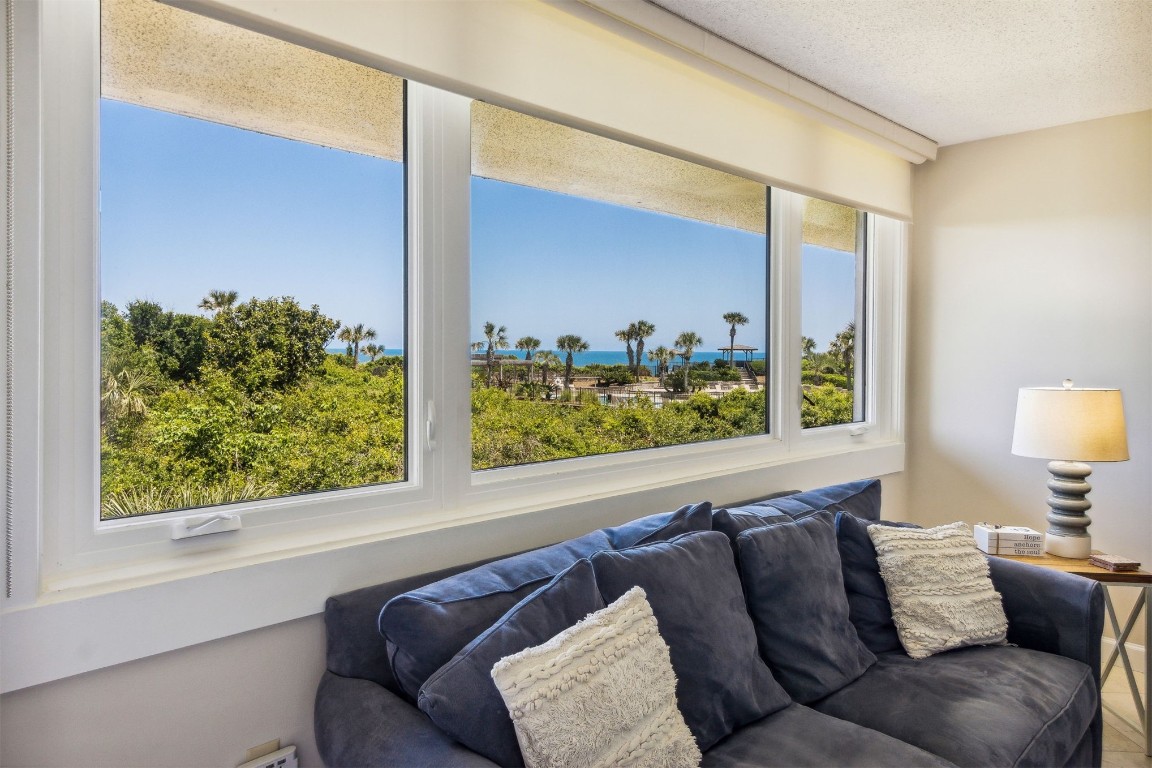 1107 Beach Walker Road, Unit 1107 Fernandina Beach, FL 32034 - Photo 2 of 63 a living room with couch and a window