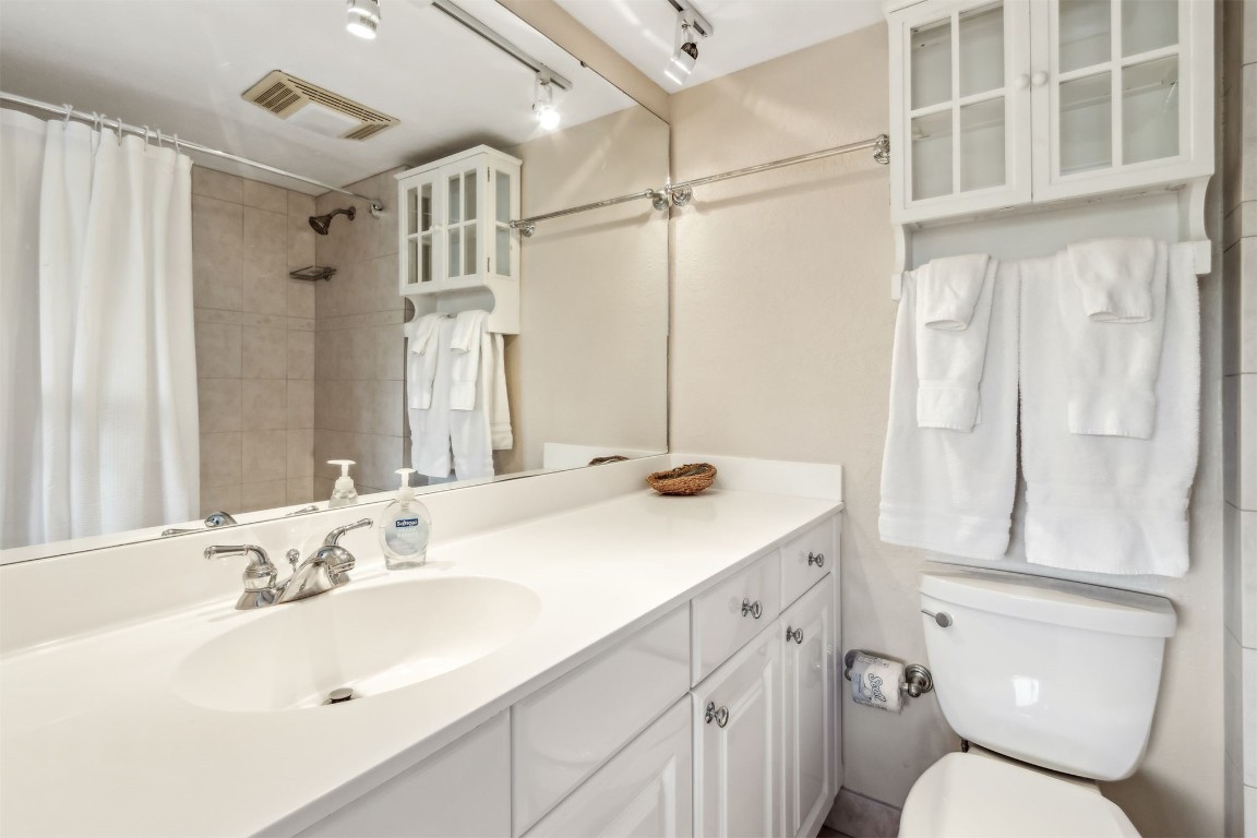 1107 Beach Walker Road, Unit 1107 Fernandina Beach, FL 32034 - Photo 20 of 63 a bathroom with a sink toilet double vanity and tub