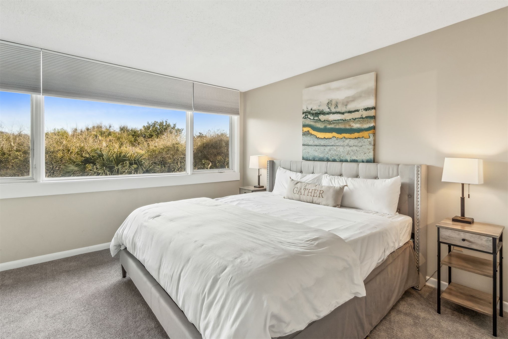 1107 Beach Walker Road, Unit 1107 Fernandina Beach, FL 32034 - Photo 22 of 63 a bedroom with a bed and a large window