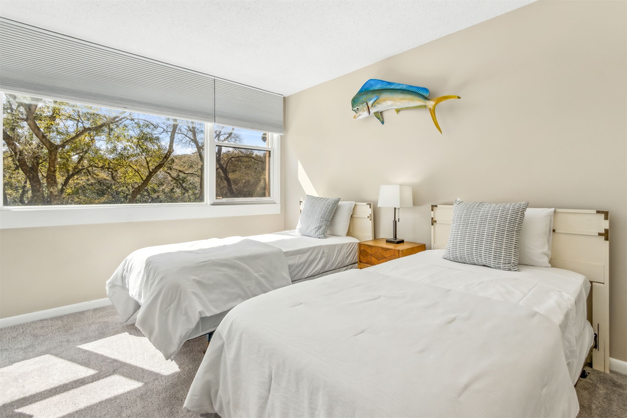 1107 Beach Walker Road, Unit 1107 Fernandina Beach, FL 32034 - Photo 27 of 63 a bedroom with two beds and a large window