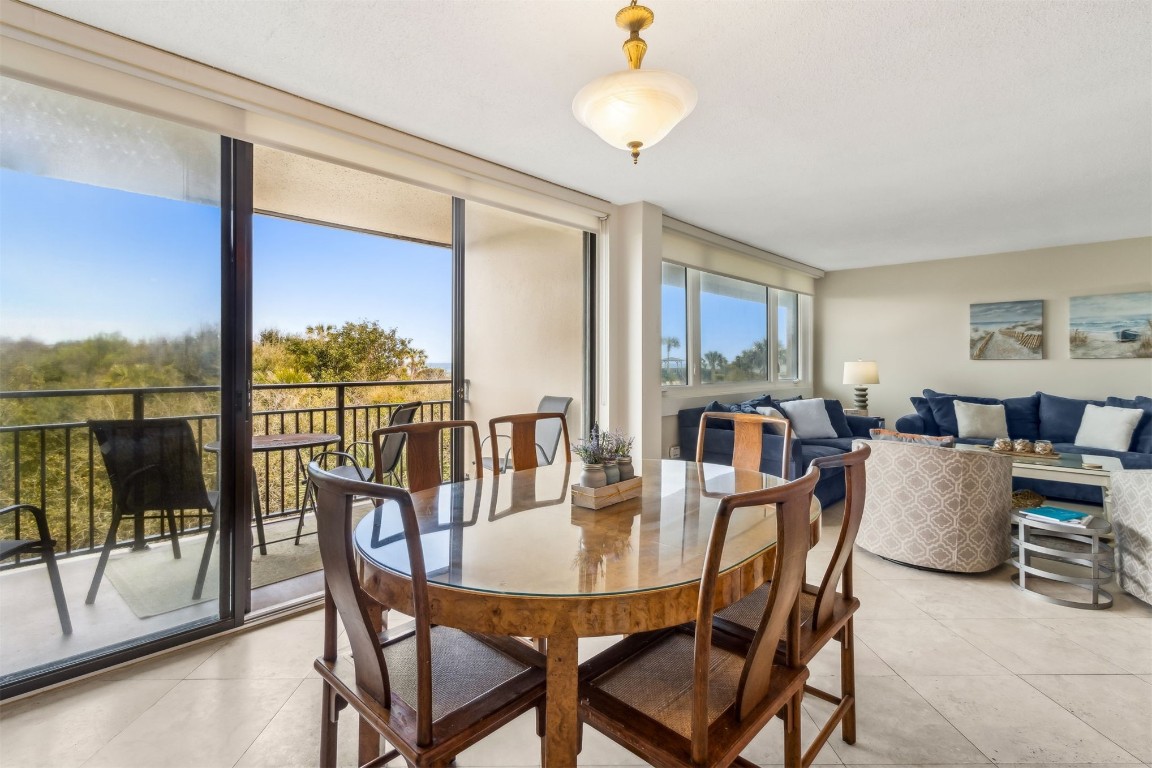 1107 Beach Walker Road, Unit 1107 Fernandina Beach, FL 32034 - Photo 3 of 63 a view of a dining room with furniture window and outside view