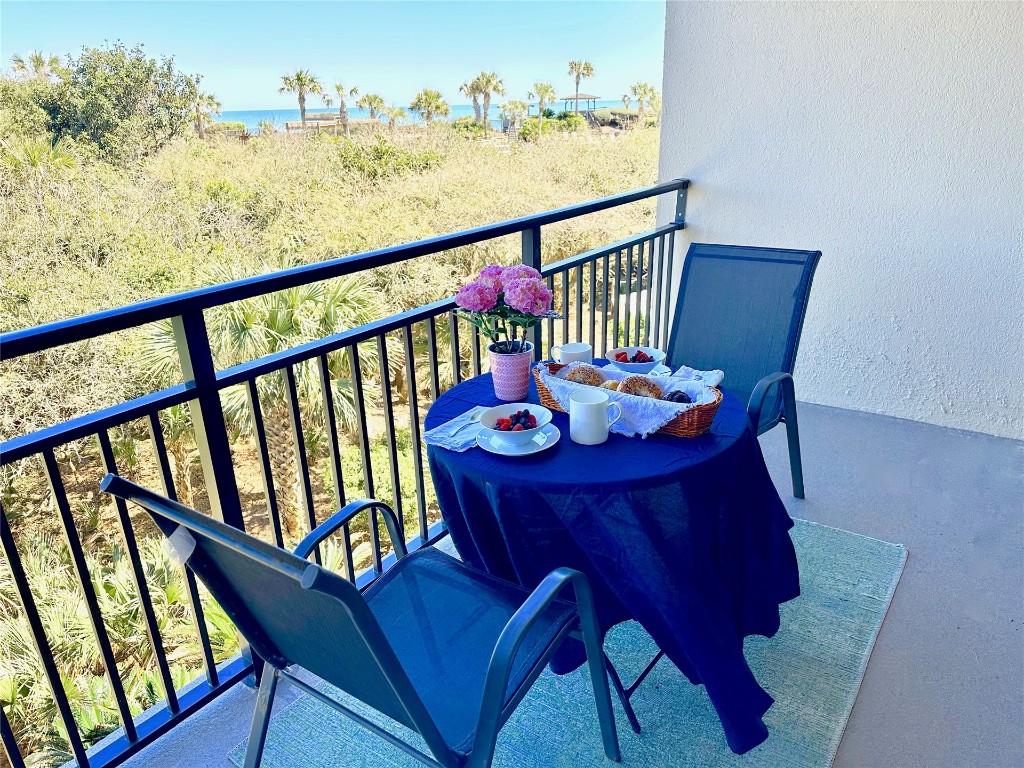 1107 Beach Walker Road, Unit 1107 Fernandina Beach, FL 32034 - Photo 4 of 63 a view of a balcony with furniture
