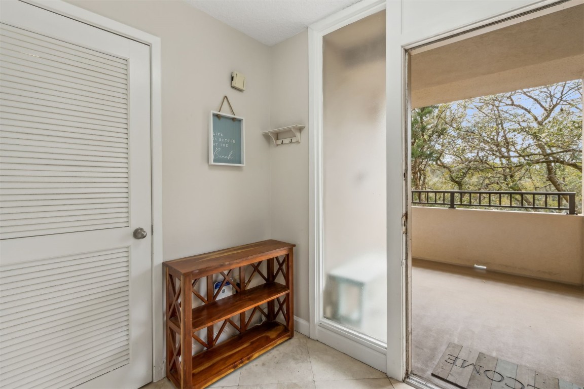 1107 Beach Walker Road, Unit 1107 Fernandina Beach, FL 32034 - Photo 8 of 63 a view of an entryway with wooden floor