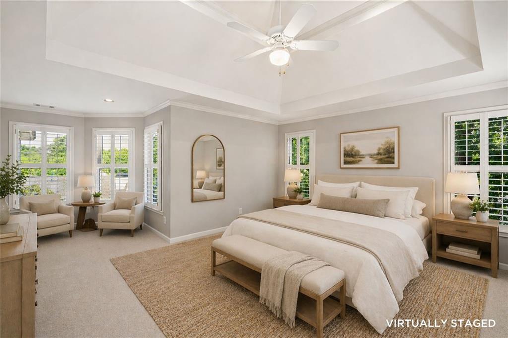 520 Redding View Court Northwest Sandy Springs, GA 30328 - Photo 13 of 27 a bedroom with a large bed and a couch