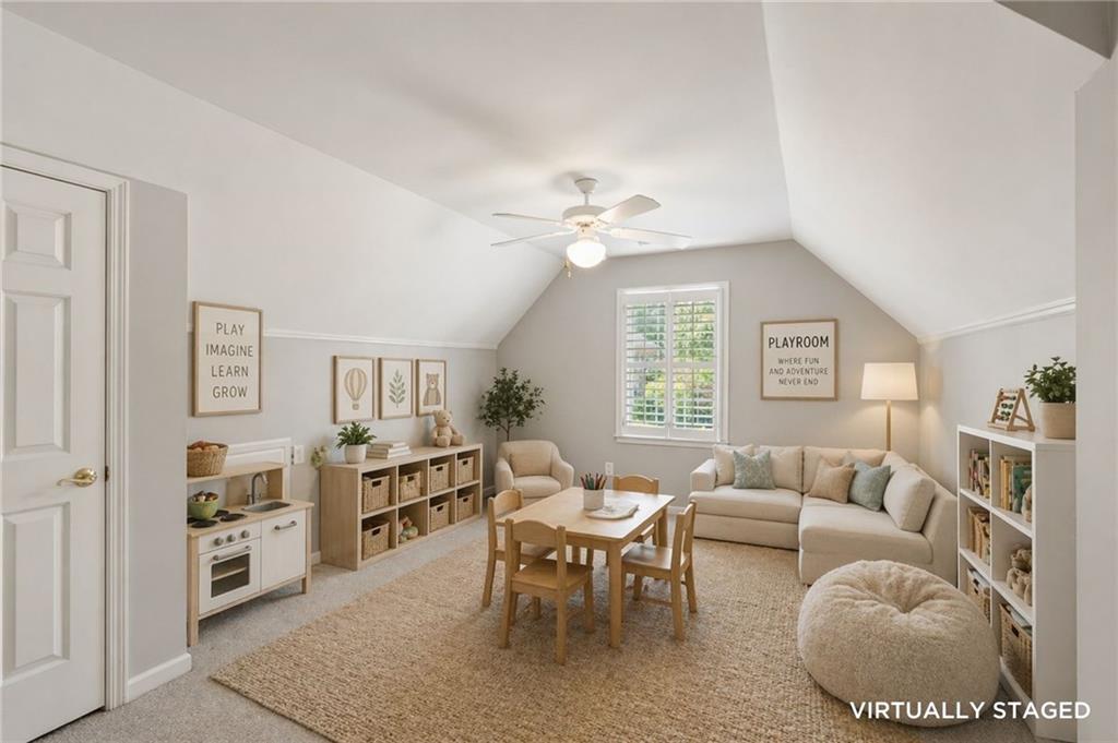 520 Redding View Court Northwest Sandy Springs, GA 30328 - Photo 20 of 27 a living room with furniture and a wooden floor