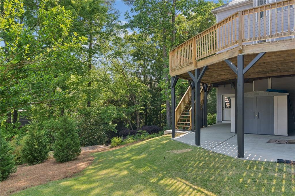 520 Redding View Court Northwest Sandy Springs, GA 30328 - Photo 24 of 27 a front view of a house with a yard