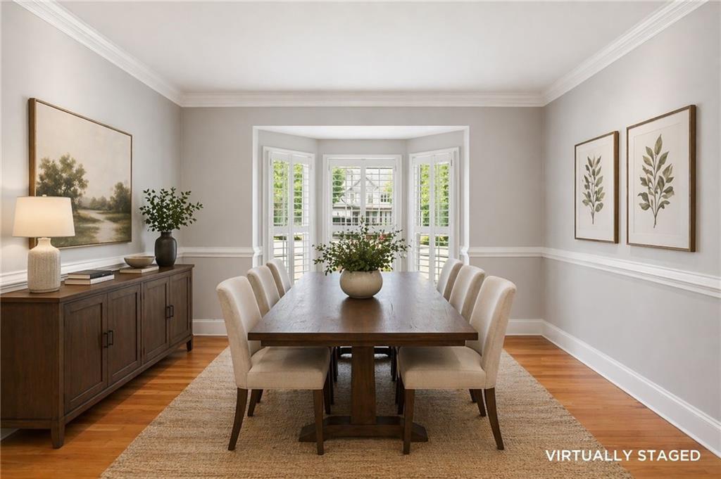 520 Redding View Court Northwest Sandy Springs, GA 30328 - Photo 5 of 27 a view of a a dining room with furniture window and wooden floor