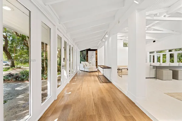 a view of a living room with a large window