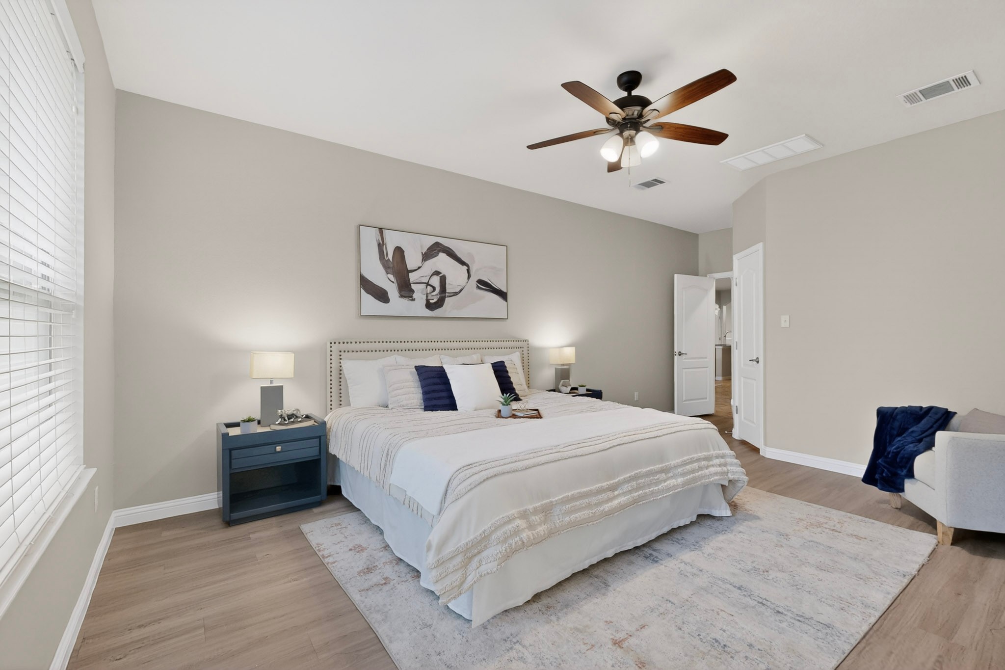 178 Limestone Trail Austin, TX 78737 - Photo 19 of 40 Spacious room featuring wood-finish flooring, a contemporary ceiling fan, and recessed lighting