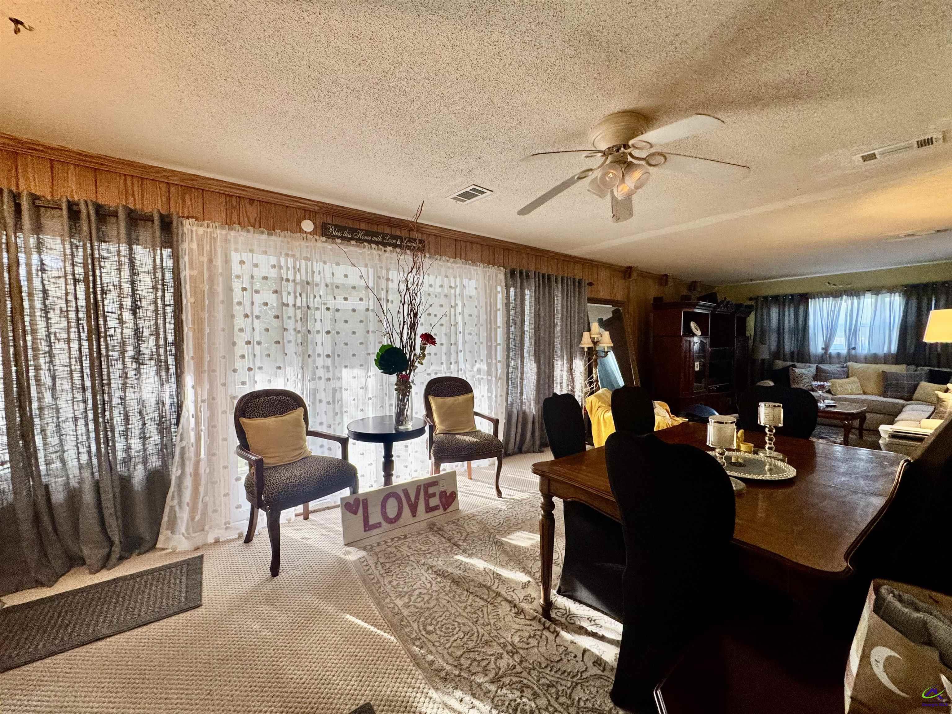 914 Adderton Street Americus, GA 31719 - Photo 17 of 53 a living room with furniture and a large window