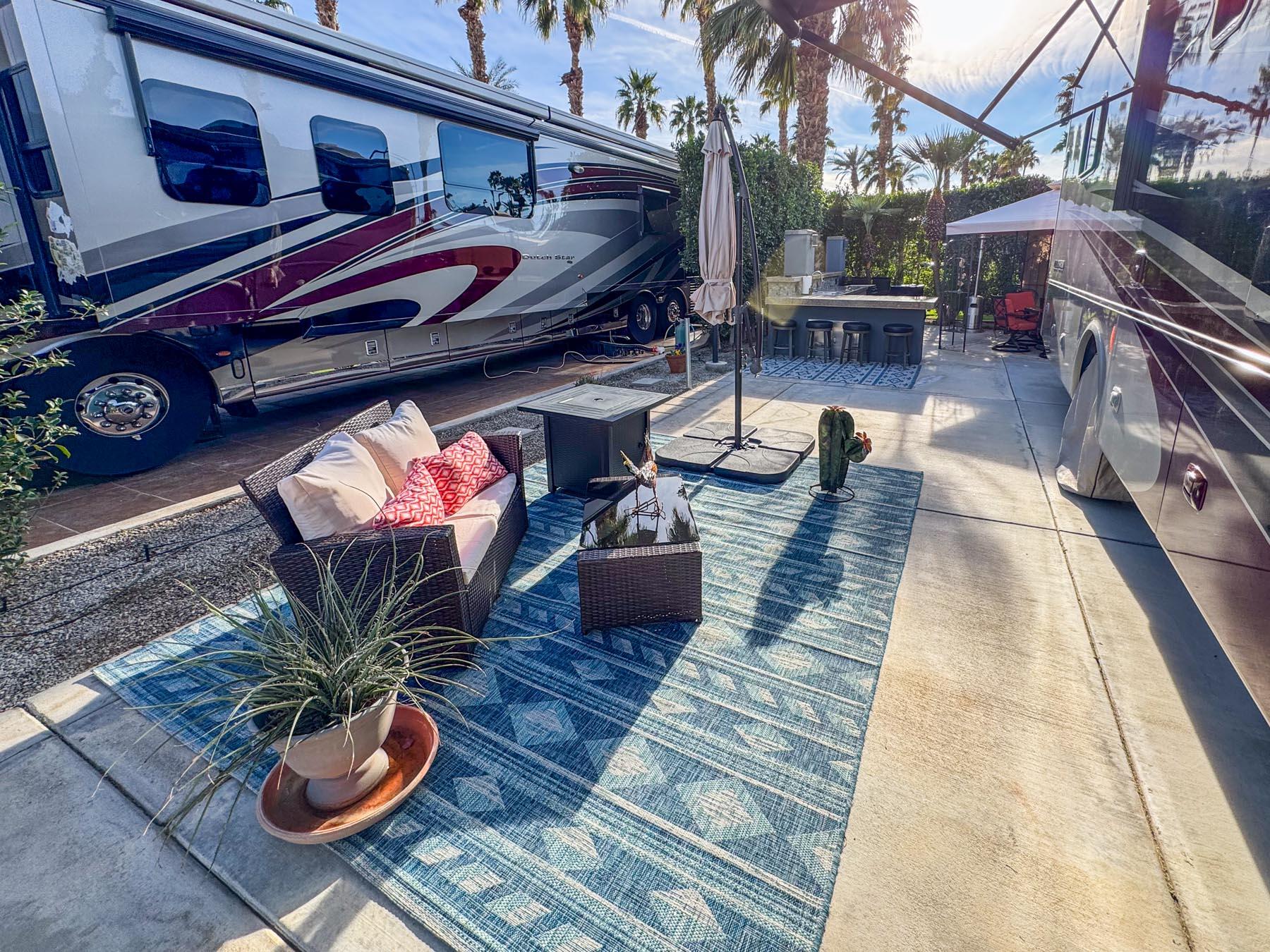 80394 Ave 48, Unit 36 Indio, CA 92201 - Photo 16 of 17 a backyard of a house with barbeque oven table and chairs