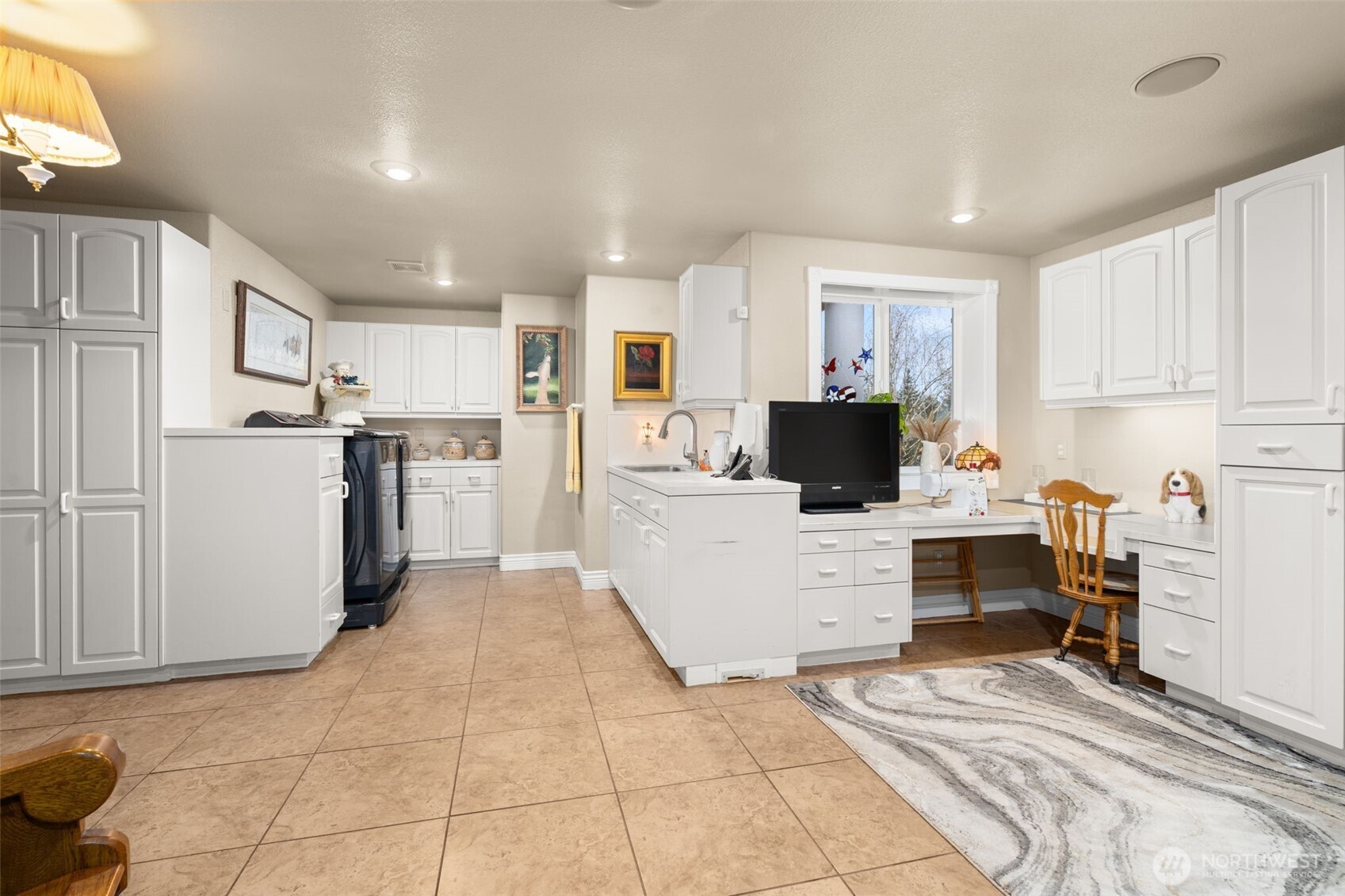 2599 Seminary Hill Road Centralia, WA 98531 - Photo 19 of 40 a view of kitchen with kitchen island microwave and cabinets