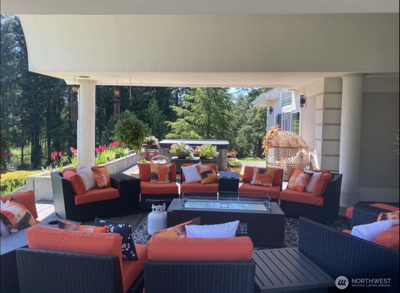 2599 Seminary Hill Road Centralia, WA 98531 - Photo 24 of 40 a outdoor living space with furniture and a floor to ceiling window