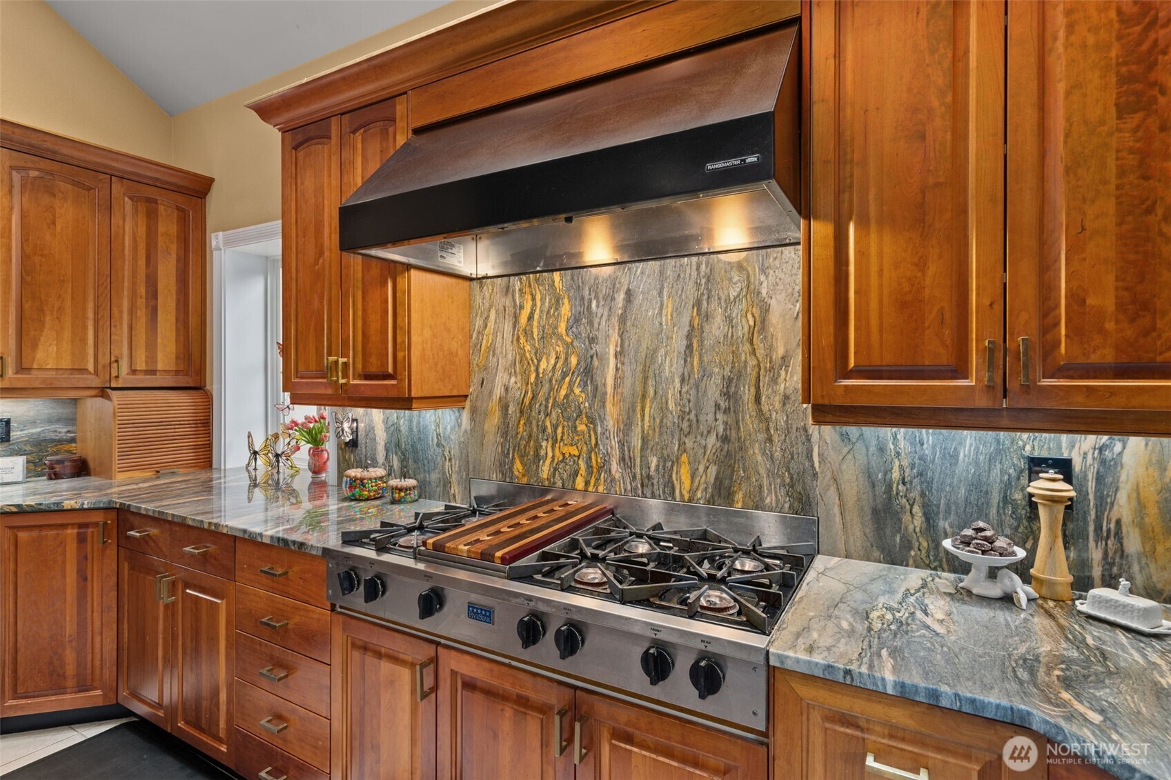 2599 Seminary Hill Road Centralia, WA 98531 - Photo 6 of 40 a kitchen with granite countertop a stove and a sink