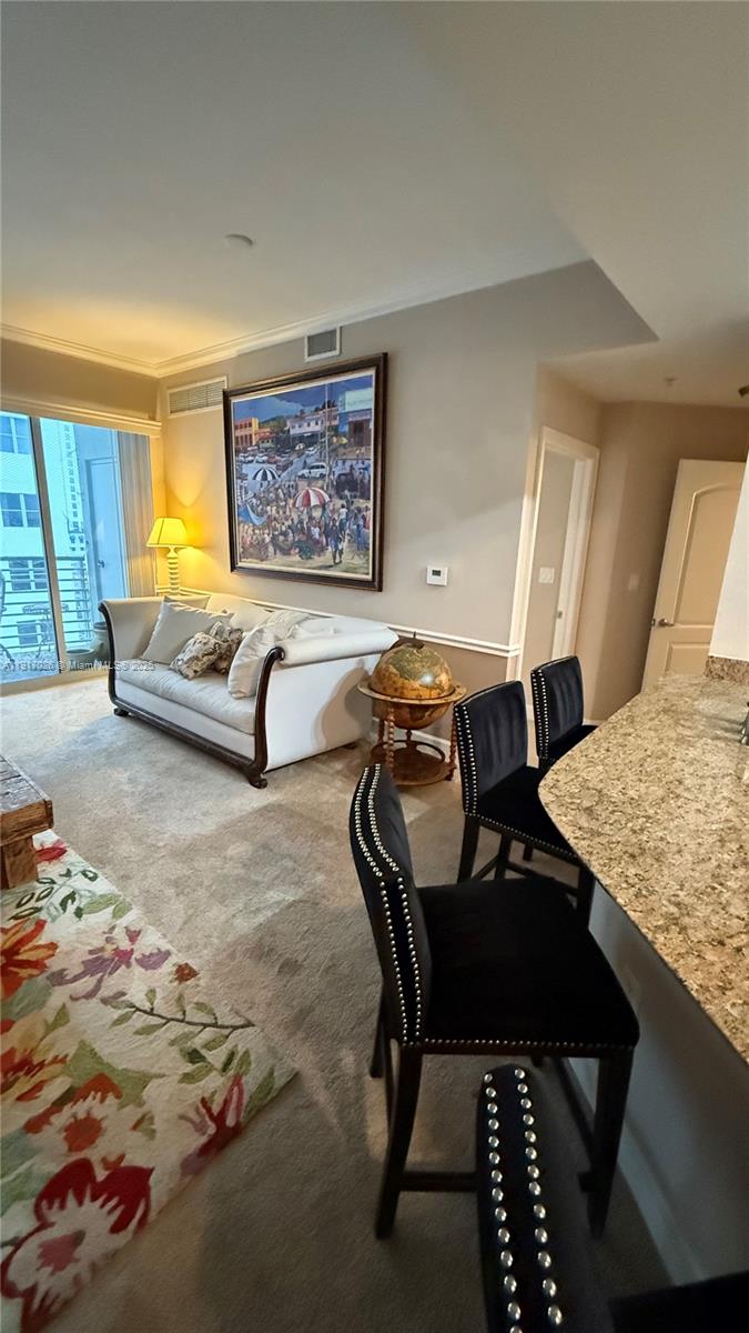 1830 Radius Drive, Unit 1105 Hollywood, FL 33020 - Photo 13 of 32 a living room with furniture