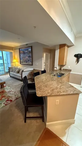 a view of a living room and dining room