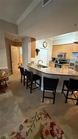 a view of a workspace with furniture