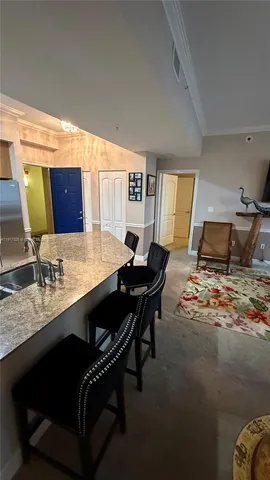 a living room with couch and a table