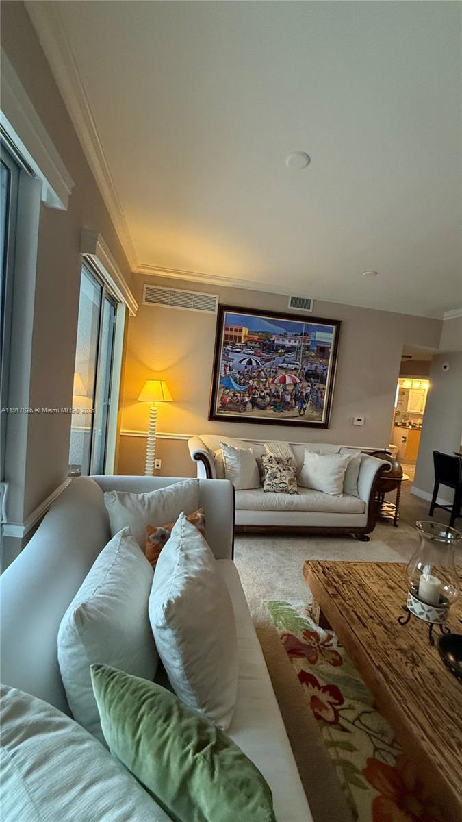 1830 Radius Drive, Unit 1105 Hollywood, FL 33020 - Photo 8 of 32 a living room with furniture