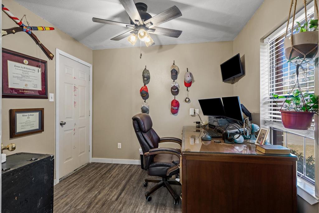 163 Granada Square Canton, TX 75103 - Photo 12 of 35 a view of a workspace with furniture and a flat screen tv