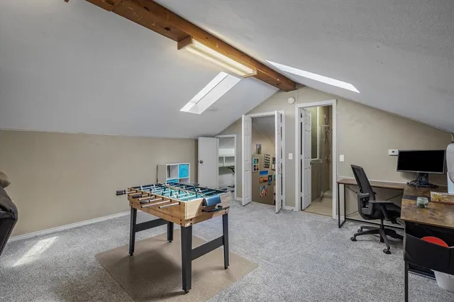 a view of a workspace with furniture